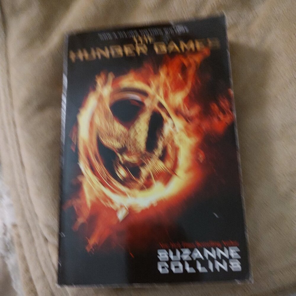 The Hunger Games paper back book by Susanne Collins